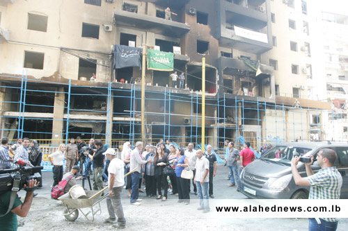 حملة اعادة ترميم المباني في الرويس